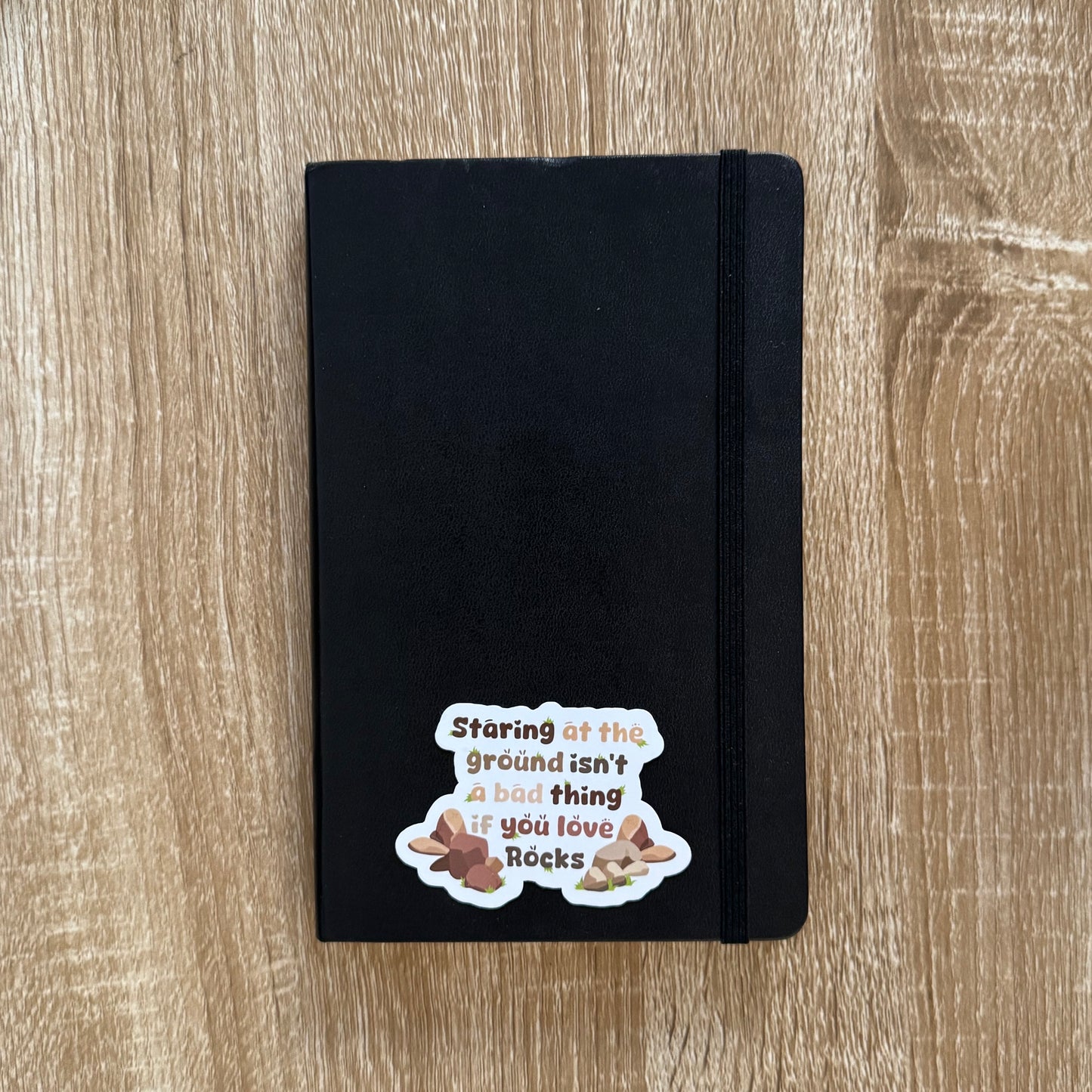 Staring At The Ground Rocks Sticker