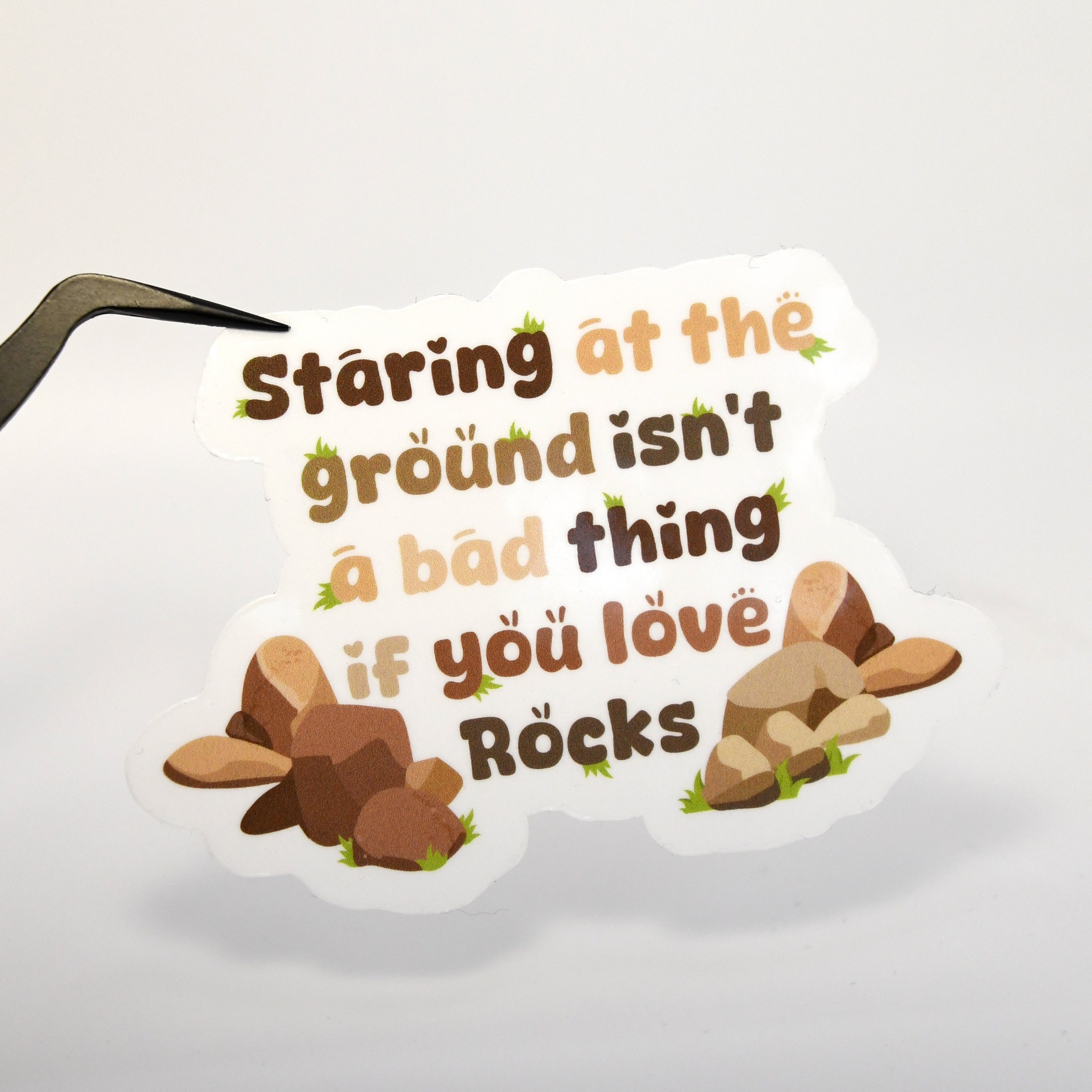 Staring At The Ground Rocks Sticker – Map & Memo