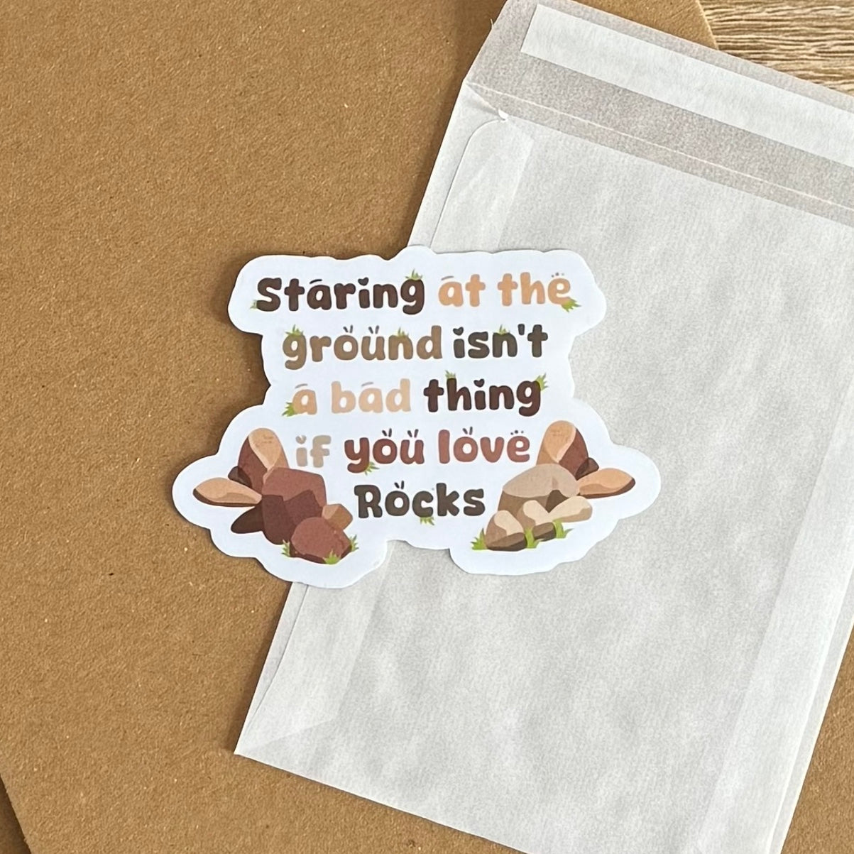 Staring At The Ground Rocks Sticker